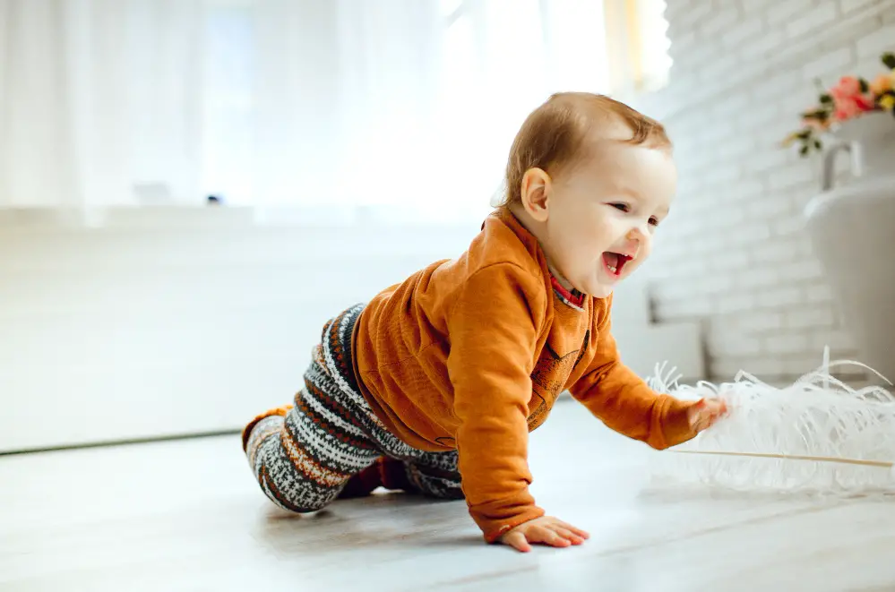 When Does a Baby Start Crawling? How to Keep Crawling Baby Safe